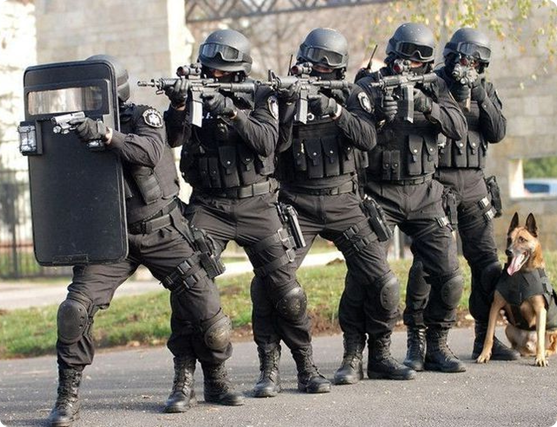 Tactical team with shields in formation